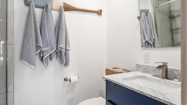 3555 Sellers Dr NE, Millersport, OH 43046 - full bath with vanity, a stall shower, and toilet