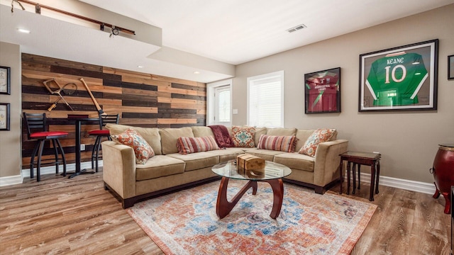 3555 Sellers Dr NE, Millersport, OH 43046 - living room featuring wood walls, wood finished floors, baseboards, and recessed lighting