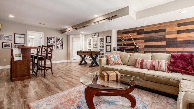 3555 Sellers Dr NE, Millersport, OH 43046 - living area with baseboards, wood finished floors, wooden walls, and recessed lighting