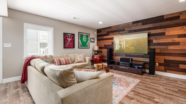 3555 Sellers Dr NE, Millersport, OH 43046 - living room with wood walls, baseboards, recessed lighting, and wood finished floors