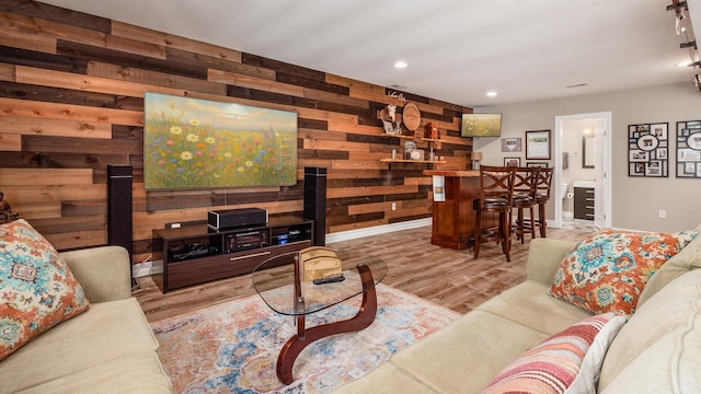 3555 Sellers Dr NE, Millersport, OH 43046 - living room featuring wooden walls, wood finished floors, recessed lighting, and baseboards