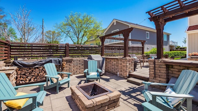 3555 Sellers Dr NE, Millersport, OH 43046 - view of patio / terrace featuring a fire pit and a pergola