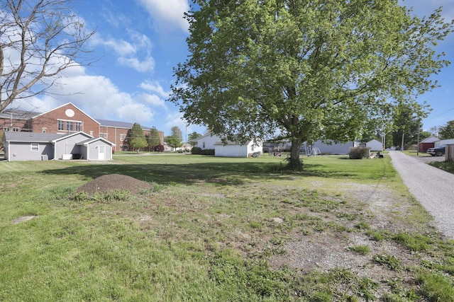 view of yard featuring a garage