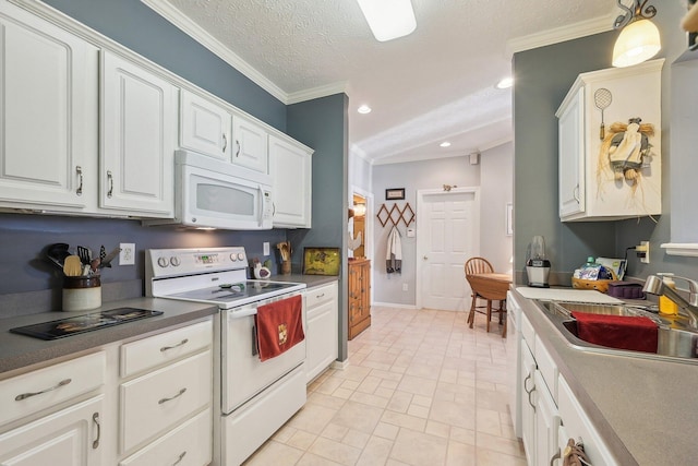 kitchen featuring crown molding, white appliances, recessed lighting, white cabinets, and a sink