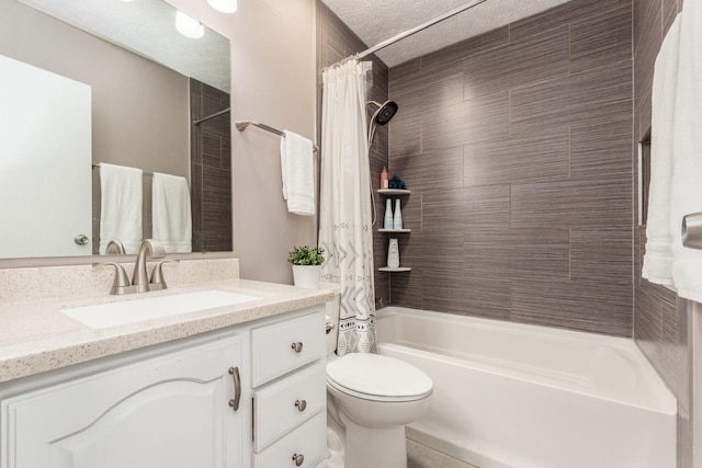 full bath with vanity, toilet, a textured ceiling, and shower / bath combination with curtain