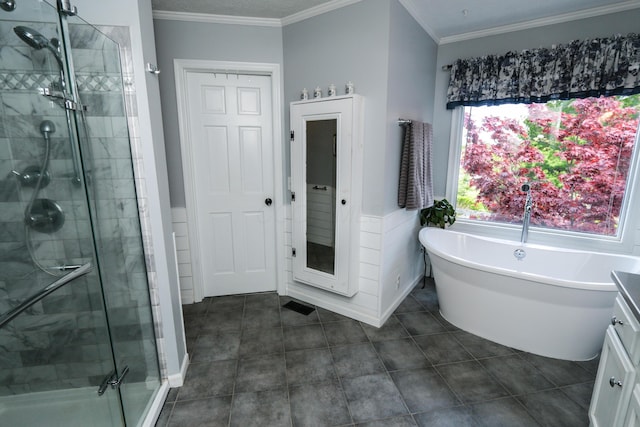 bathroom featuring a freestanding bath, tile patterned flooring, a shower stall, and ornamental molding