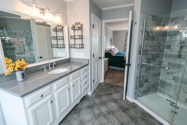 ensuite bathroom with a stall shower, ensuite bathroom, tile patterned floors, vanity, and crown molding