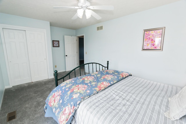 carpeted bedroom featuring ceiling fan, a closet, baseboards, and visible vents