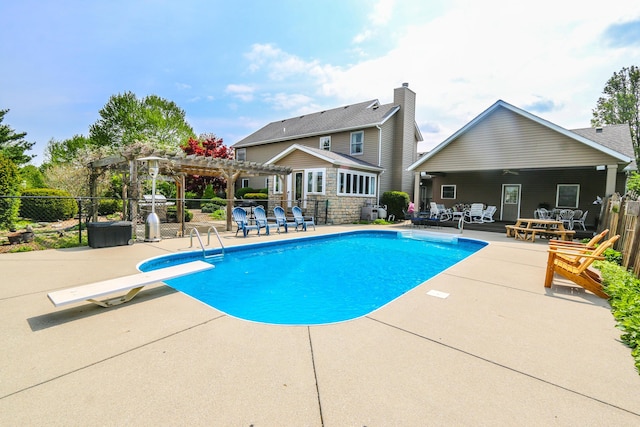 view of swimming pool featuring a pergola, a patio area, a fenced in pool, and fence