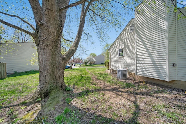 view of yard with central AC