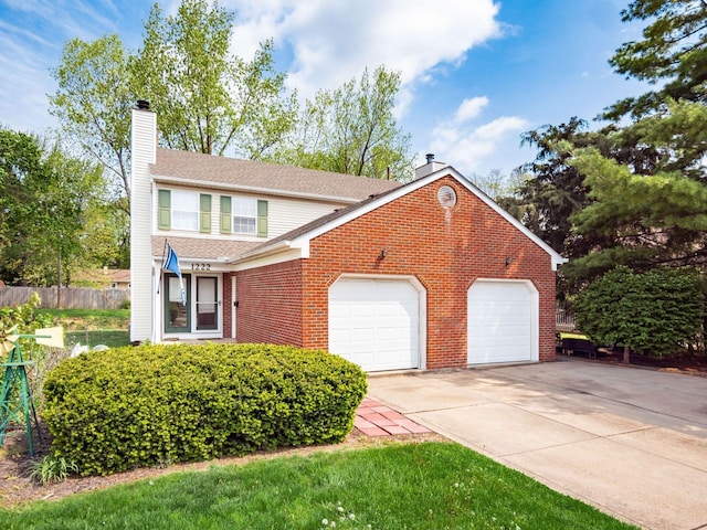view of front of property featuring an attached garage, brick siding, a chimney, and concrete driveway