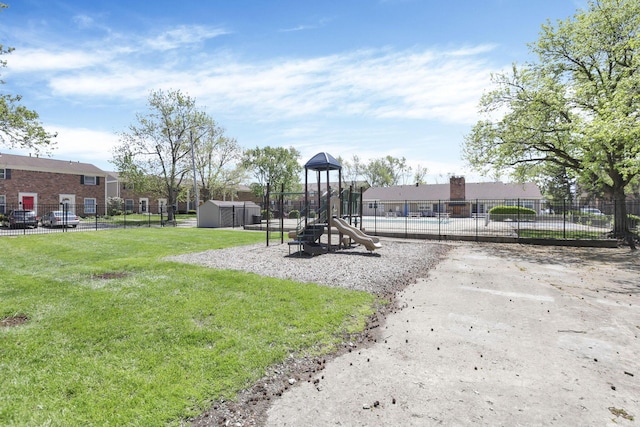 community playground with fence and a yard