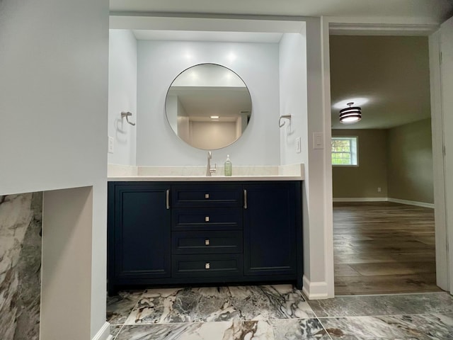 357 Carroll Eastern Rd NW, Baltimore, OH 43105 - bathroom with baseboards and vanity