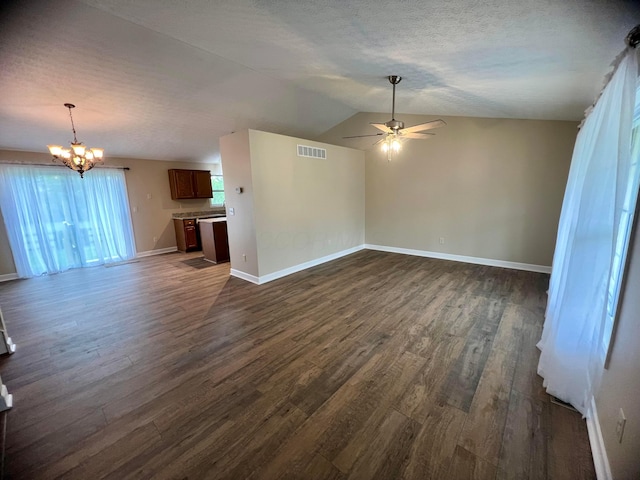 357 Carroll Eastern Rd NW, Baltimore, OH 43105 - unfurnished living room featuring ceiling fan with notable chandelier, a textured ceiling, visible vents, baseboards, and dark wood-style floors