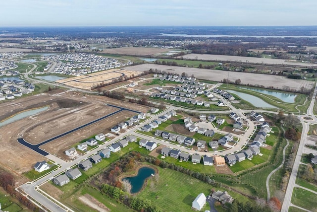 aerial view with a residential view and a water view