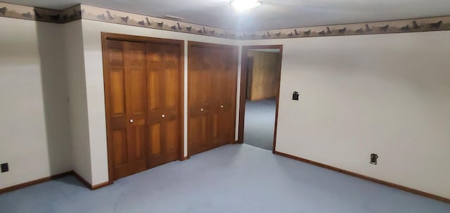 unfurnished bedroom featuring baseboards