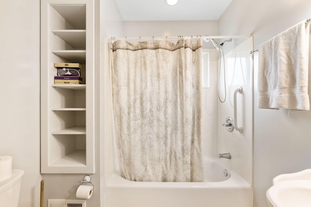 22 Elizabeth St, Delaware, OH 43015 - bathroom with toilet and shower / bathtub combination with curtain