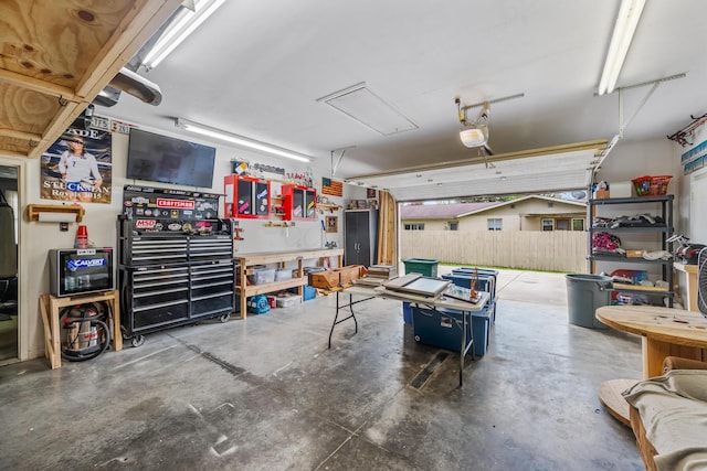1083 Martha Ave, Bucyrus, OH 44820 - garage featuring a workshop area and a garage door opener