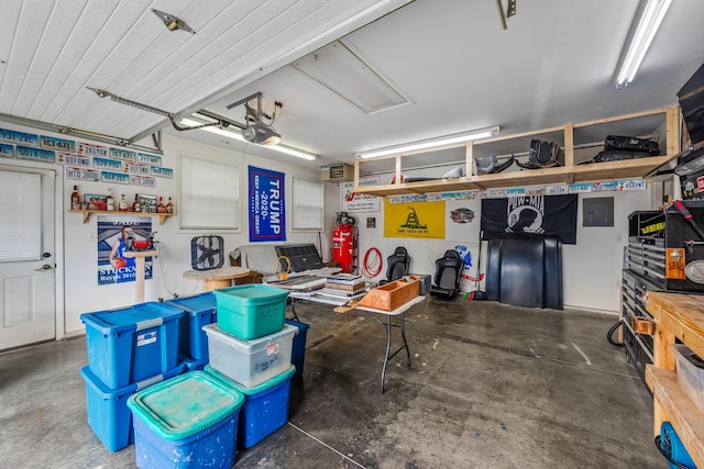 1083 Martha Ave, Bucyrus, OH 44820 - garage with a garage door opener and electric panel