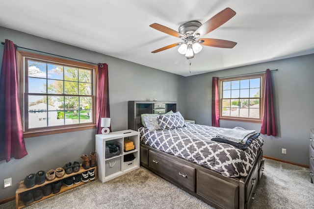 1083 Martha Ave, Bucyrus, OH 44820 - carpeted bedroom featuring baseboards and a ceiling fan