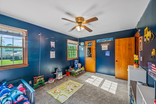 1083 Martha Ave, Bucyrus, OH 44820 - recreation room with carpet and ceiling fan