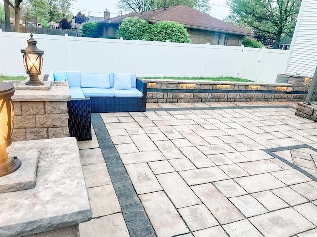 1083 Martha Ave, Bucyrus, OH 44820 - view of patio featuring a fenced backyard and outdoor lounge area