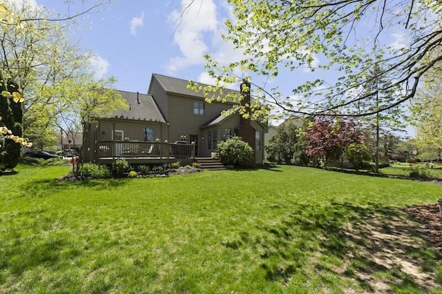 view of yard with a wooden deck
