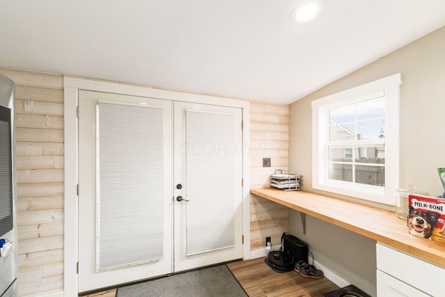 interior space with recessed lighting, wood finished floors, and built in study area