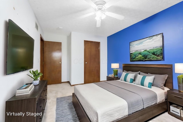 2257 Jarrow Dr, Hilliard, OH 43026 - bedroom with light carpet, a ceiling fan, and a closet
