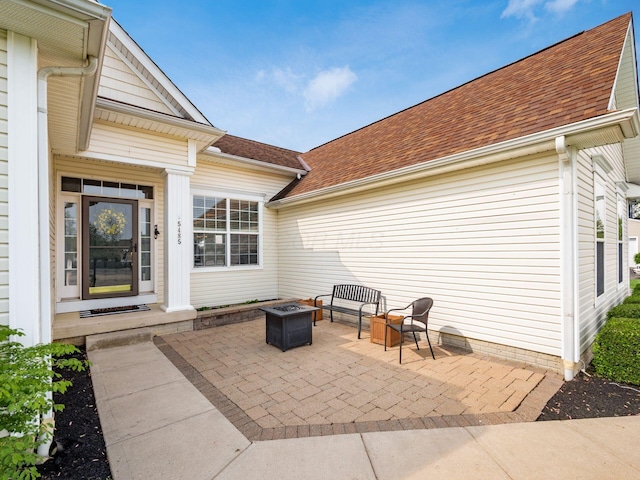 view of patio / terrace with a fire pit