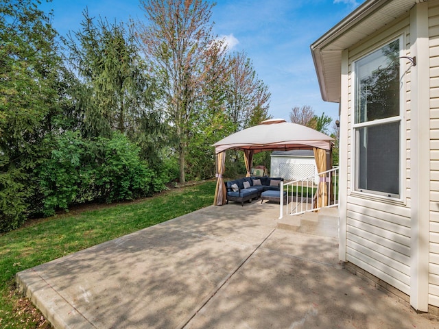 view of patio with a gazebo and outdoor lounge area