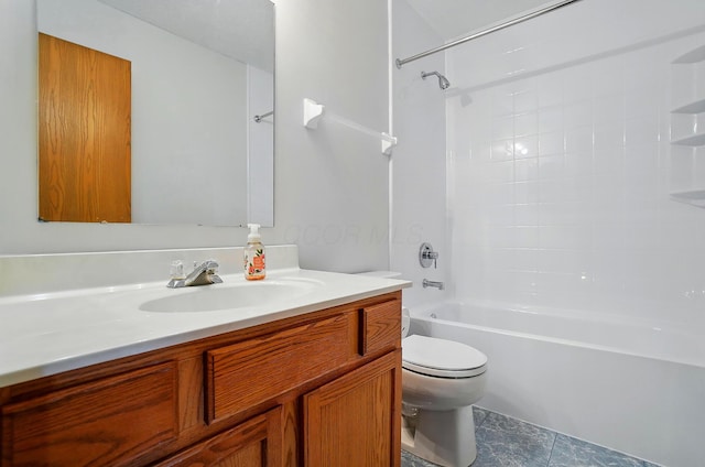 full bathroom featuring vanity, bathtub / shower combination, and toilet