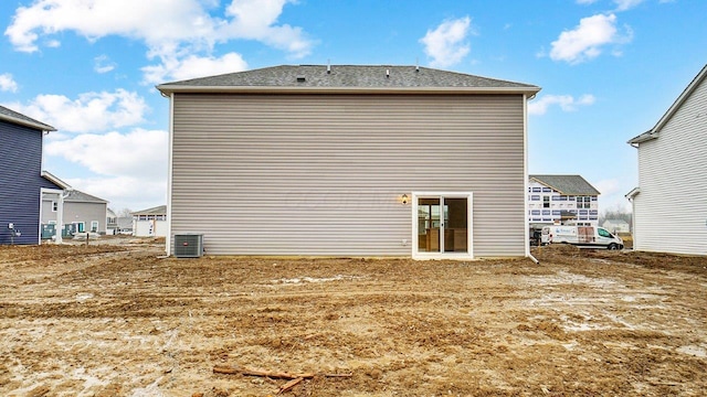 back of property with central AC unit