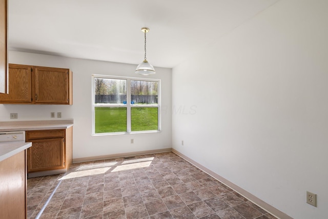 611 Sackman St, Mansfield, OH 44903 - unfurnished dining area with baseboards and stone finish floor