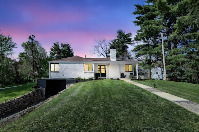 5300 Clark State Rd, Columbus, OH 43230 - view of front of home with a lawn and a chimney