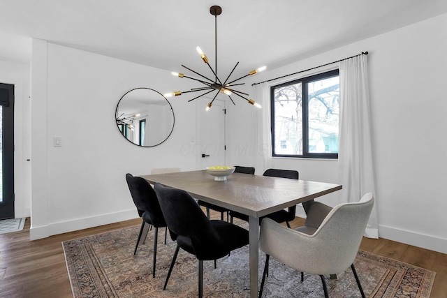 5300 Clark State Rd, Columbus, OH 43230 - dining room with baseboards, a chandelier, and wood finished floors