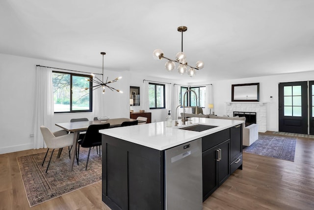 5300 Clark State Rd, Columbus, OH 43230 - kitchen with stainless steel dishwasher, a chandelier, a wealth of natural light, and a sink