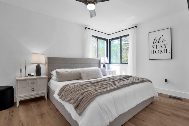 5300 Clark State Rd, Columbus, OH 43230 - bedroom featuring baseboards, ceiling fan, visible vents, and wood finished floors