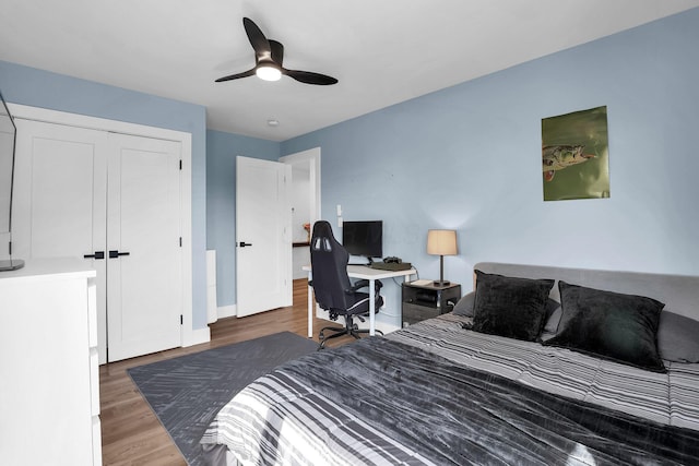 5300 Clark State Rd, Columbus, OH 43230 - bedroom featuring baseboards, ceiling fan, wood finished floors, and a closet