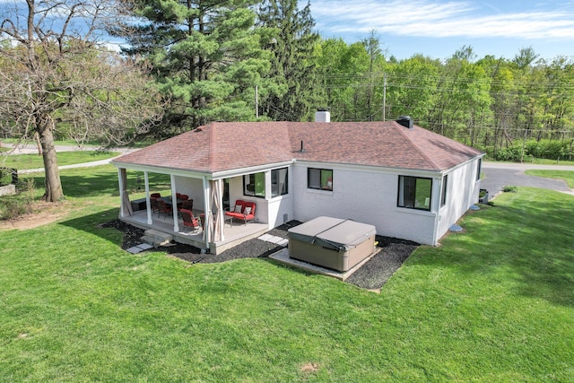 5300 Clark State Rd, Columbus, OH 43230 - rear view of house with a deck, a chimney, brick siding, a shingled roof, and a lawn