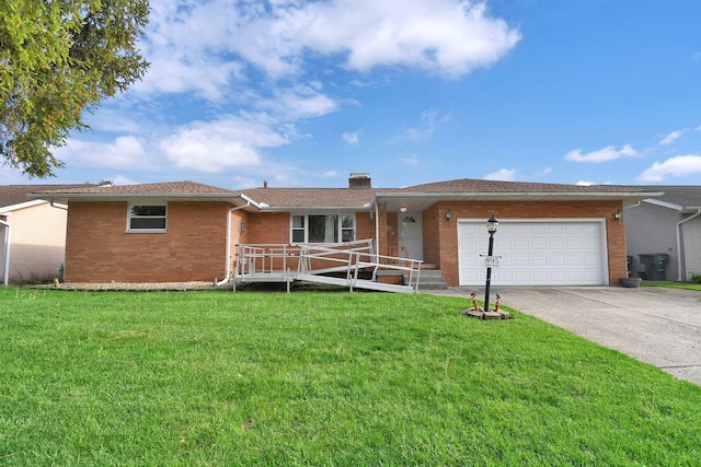 895 Janet Dr, Columbus, OH 43224 - ranch-style home featuring a garage, a front yard, driveway, and brick siding