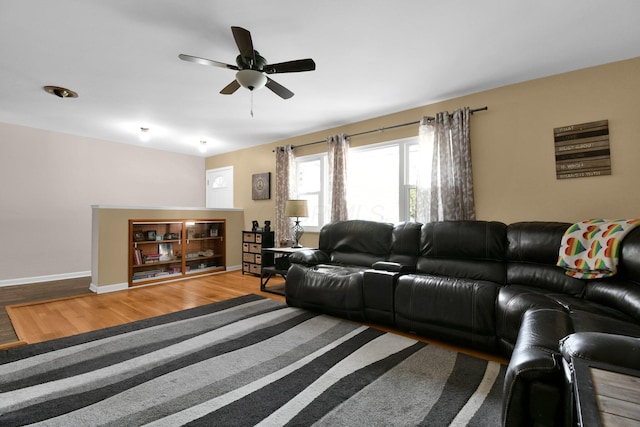 895 Janet Dr, Columbus, OH 43224 - living area with baseboards, a ceiling fan, and wood finished floors