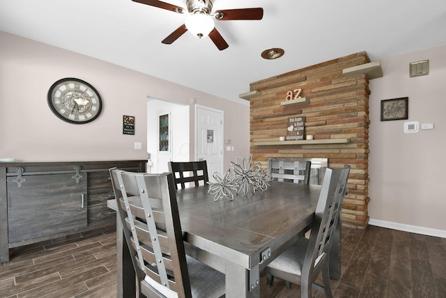 895 Janet Dr, Columbus, OH 43224 - dining room with baseboards, ceiling fan, and wood finished floors