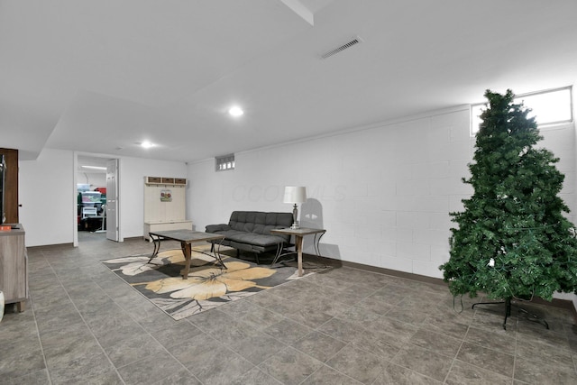 895 Janet Dr, Columbus, OH 43224 - living area featuring visible vents, recessed lighting, and concrete block wall