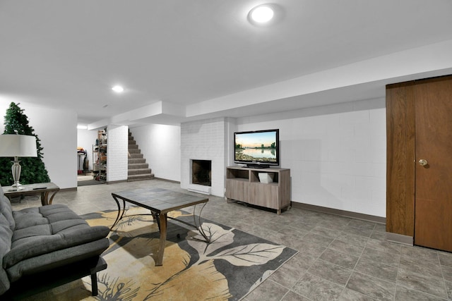 895 Janet Dr, Columbus, OH 43224 - living room with baseboards, recessed lighting, stairs, and a brick fireplace