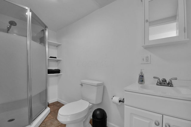 895 Janet Dr, Columbus, OH 43224 - full bath with toilet, baseboards, a shower stall, and vanity