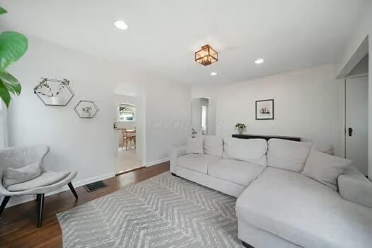 233 Girard Rd, Columbus, OH 43214 - living room with recessed lighting, baseboards, wood finished floors, and visible vents