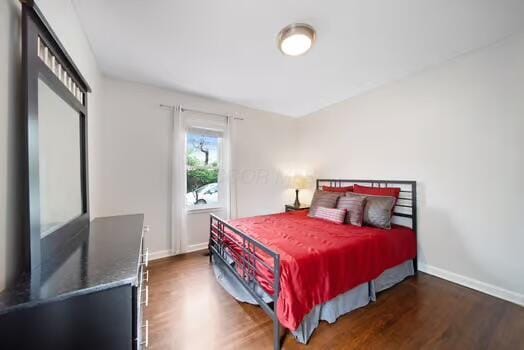 233 Girard Rd, Columbus, OH 43214 - bedroom with baseboards and wood finished floors