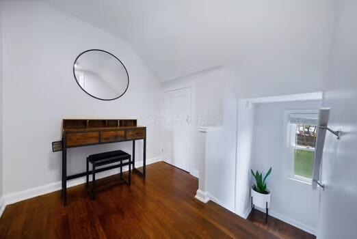 233 Girard Rd, Columbus, OH 43214 - sitting room with baseboards, vaulted ceiling, and wood finished floors