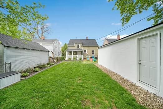 233 Girard Rd, Columbus, OH 43214 - view of yard featuring an outbuilding